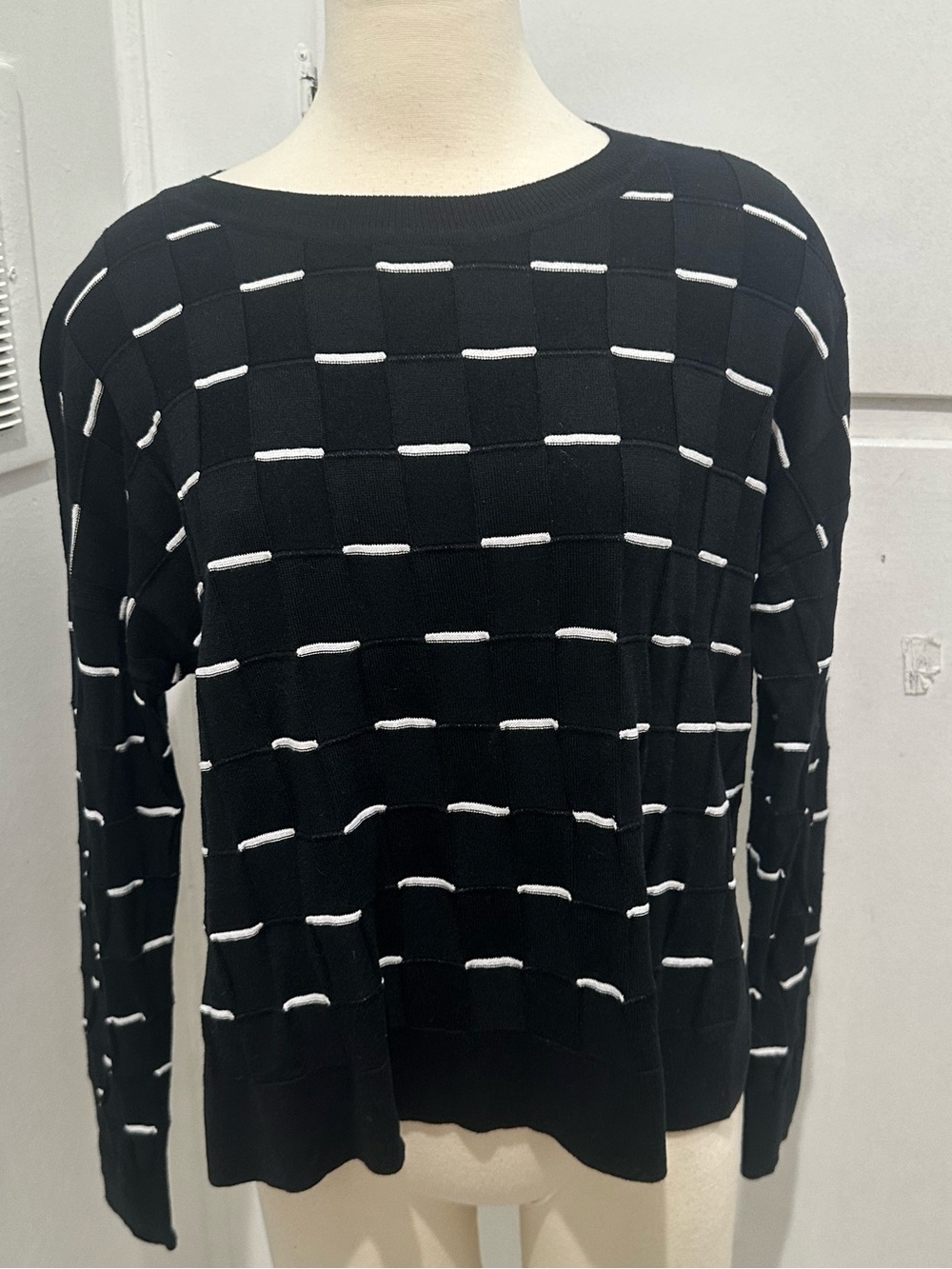 Black Long-Sleeve Knit Top with White Accent Stitching